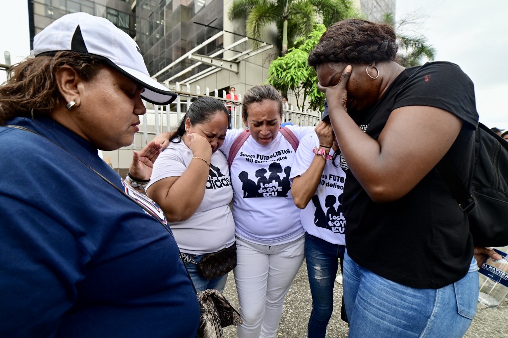 Ecuador familiares menores quemados