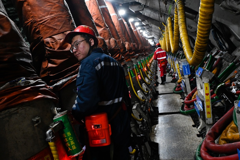 Trabajadores en una minera china. Foto: AFP